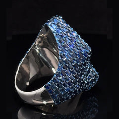 Cross Side Blue Sapphire Baguettes in White Gold Ring