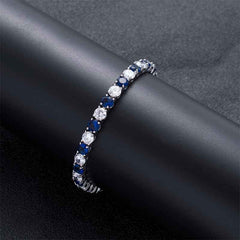 5mm White & Blue Iced Single Row Tennis Bracelet in White Gold